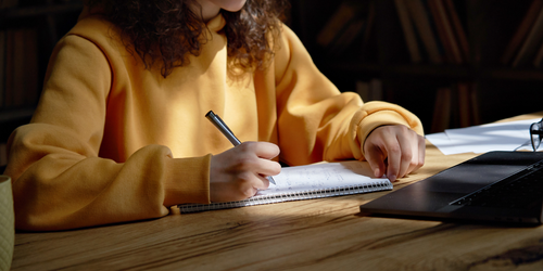 Student studying at table